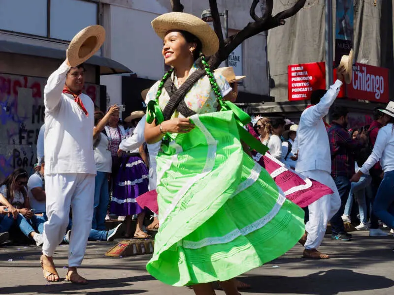A dancer from a folkloric Indigenous dance troupe from Pochutla, Oaxaca performs on Juarez Avenue in Mexico City on Sunday, March 9, 2025. Photo: José Luis Granados Ceja