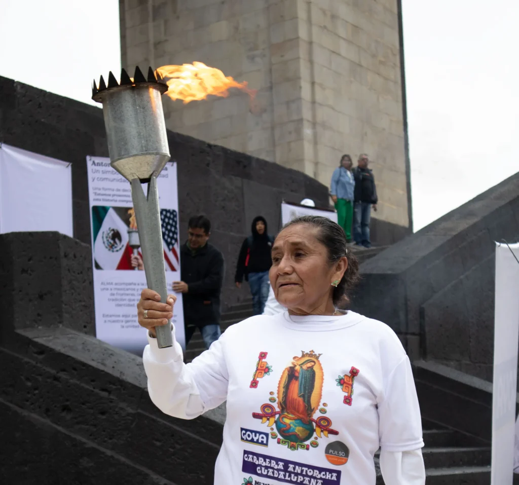 Lucía Margarita Romero holding the Guadalupe Torch. Mexico City, August 30, 2025. Hans Leguízamo / MxPA